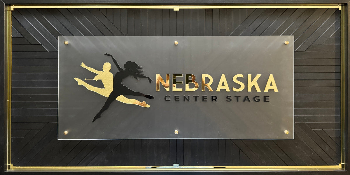 Nebraska Center Stage custom business sign – gold and black mirror acrylic on wood base